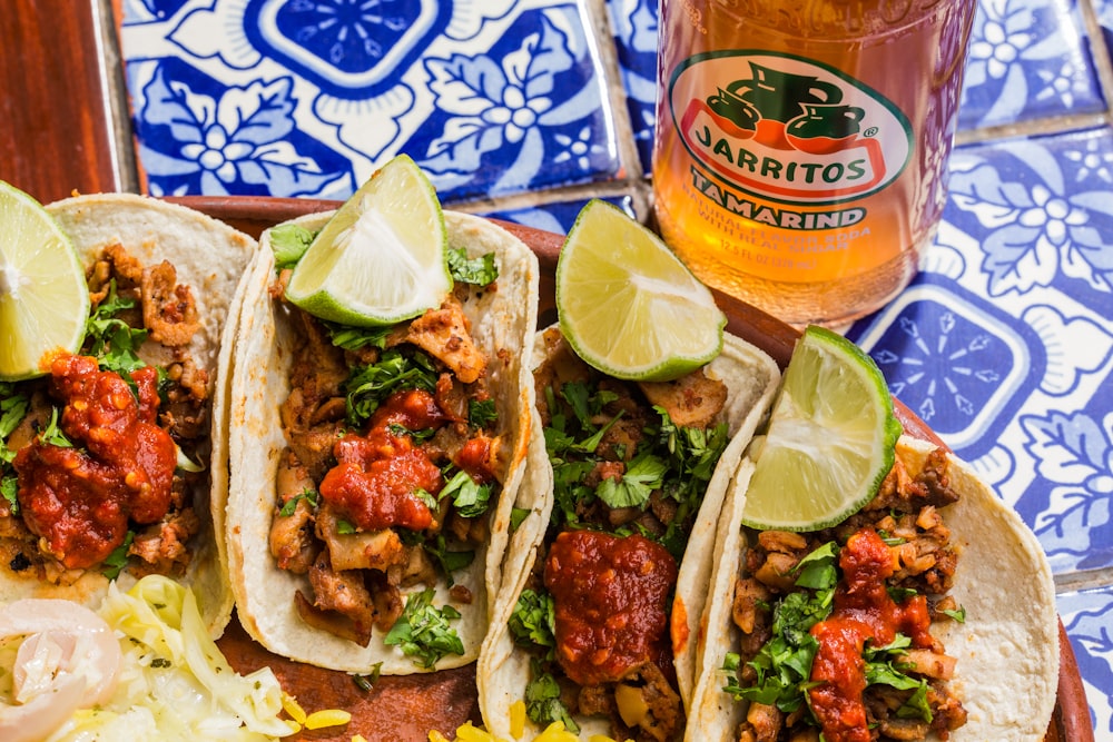 Plated tacos with colorful slaw